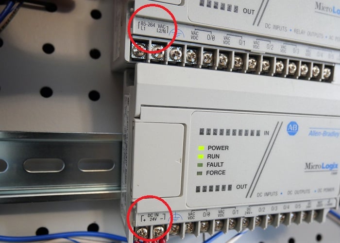 Two types of similar PLCs with different voltage inputs